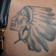 Illustration for article titled Justin Biebers Tattoos Documented by the Miami PD: A Visual Analysis
